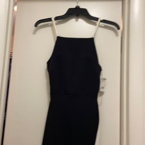 Black dress with white straps